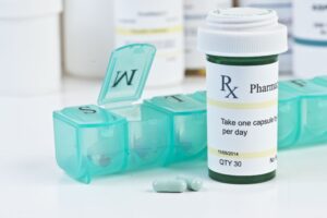 Closeup of Medication Bottle and Pill Container