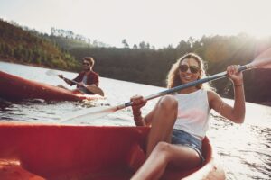 Young Couple Kayaking in a Lake
