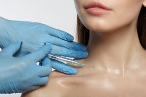 Woman being Injected in base of neck
